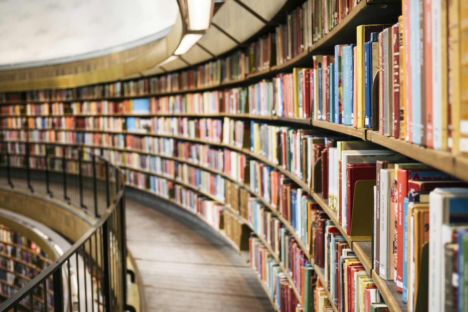 Academic library shelves representing MRI Publication's scholarly journal publishing expertise